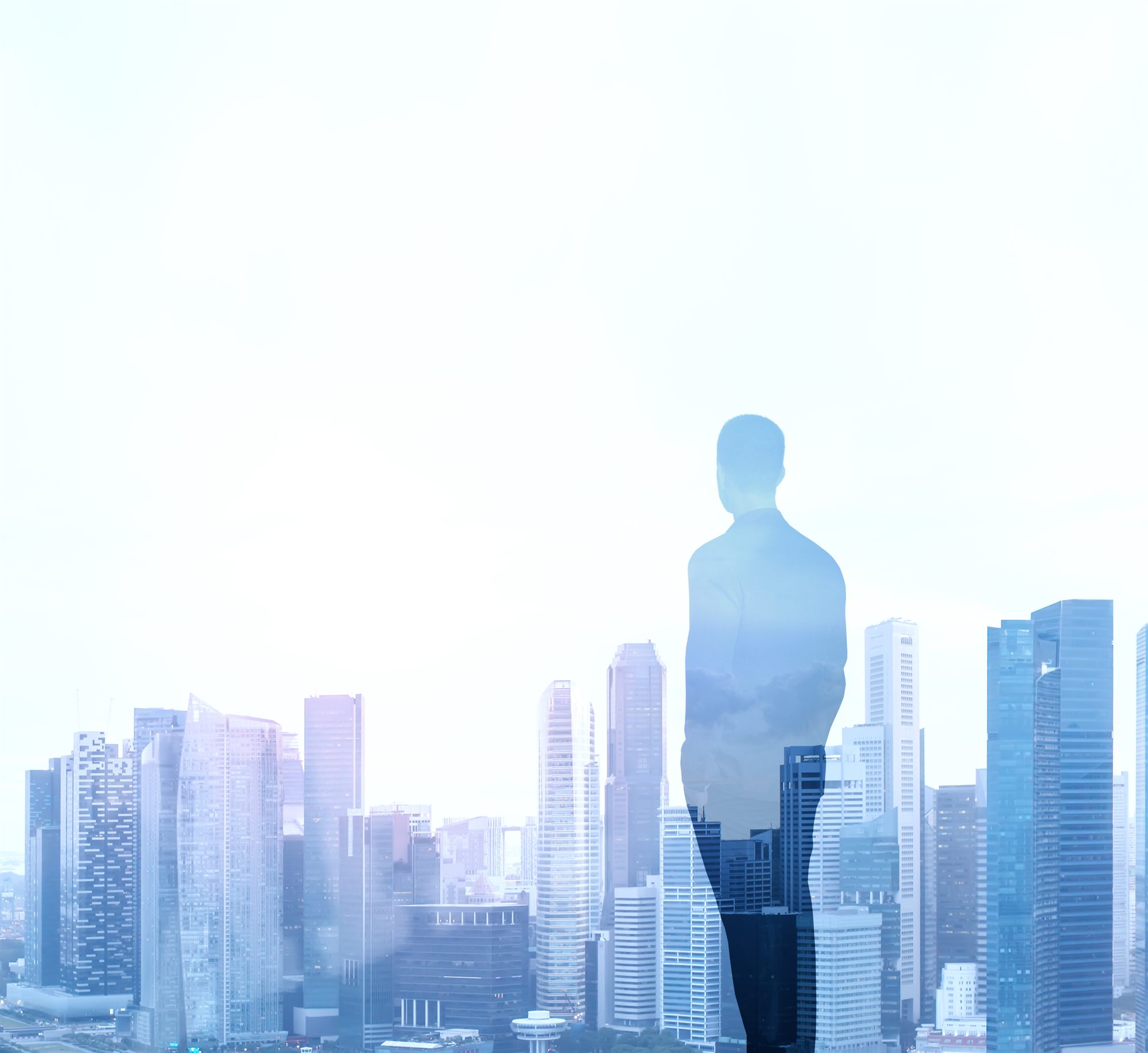Executive overlooking a global financial skyline